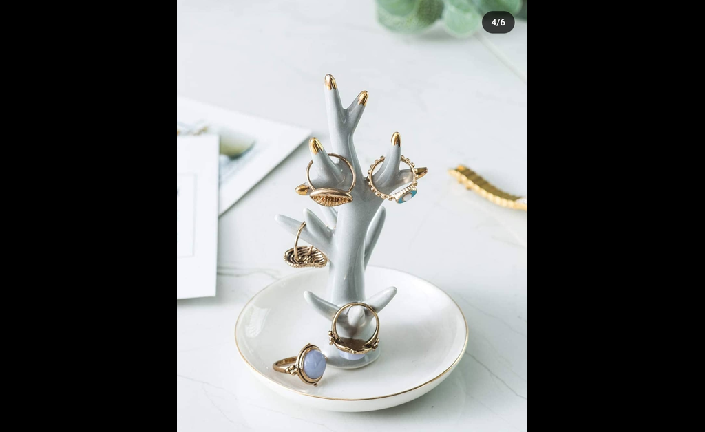 A beautiful white ring holder in cactus shape.