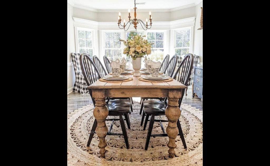 A large rustic dinning table for family gatherings.