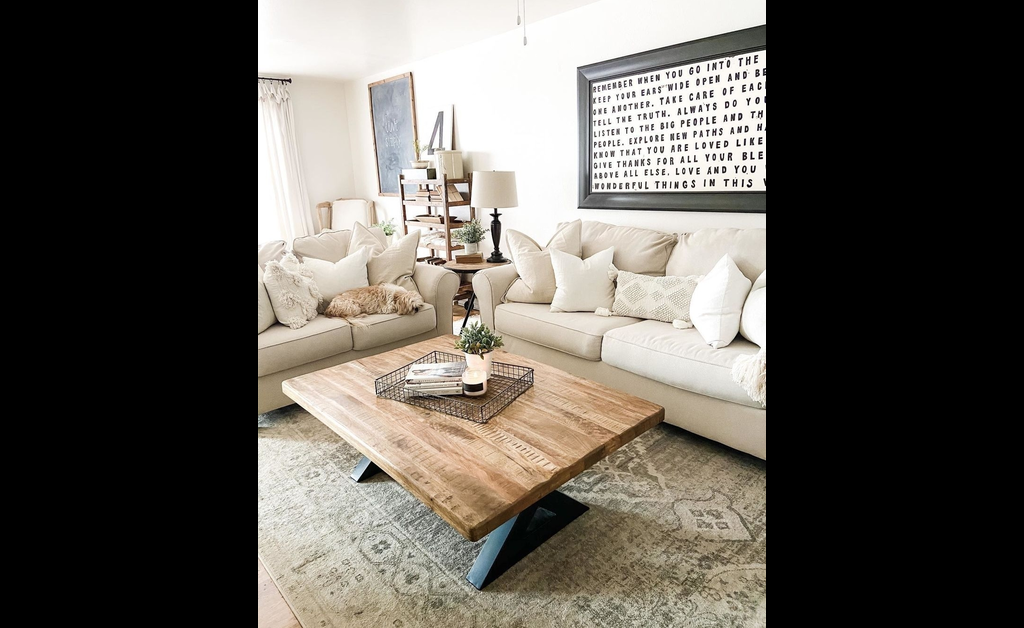 overstuff seating on printed rugs in modern farmhouse living room.