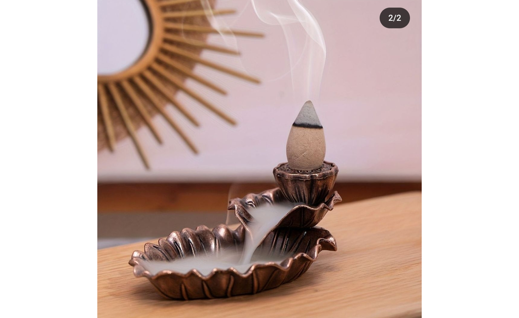 incense burner on a wooden table.