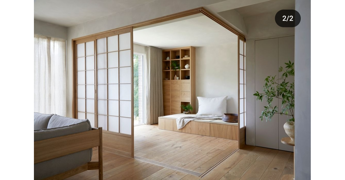 Shoji screens dividing the japanese-style living room in two portions.