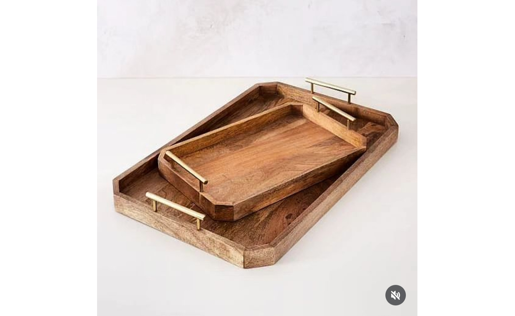 Two wooden trays,the large one having the smaller in it.